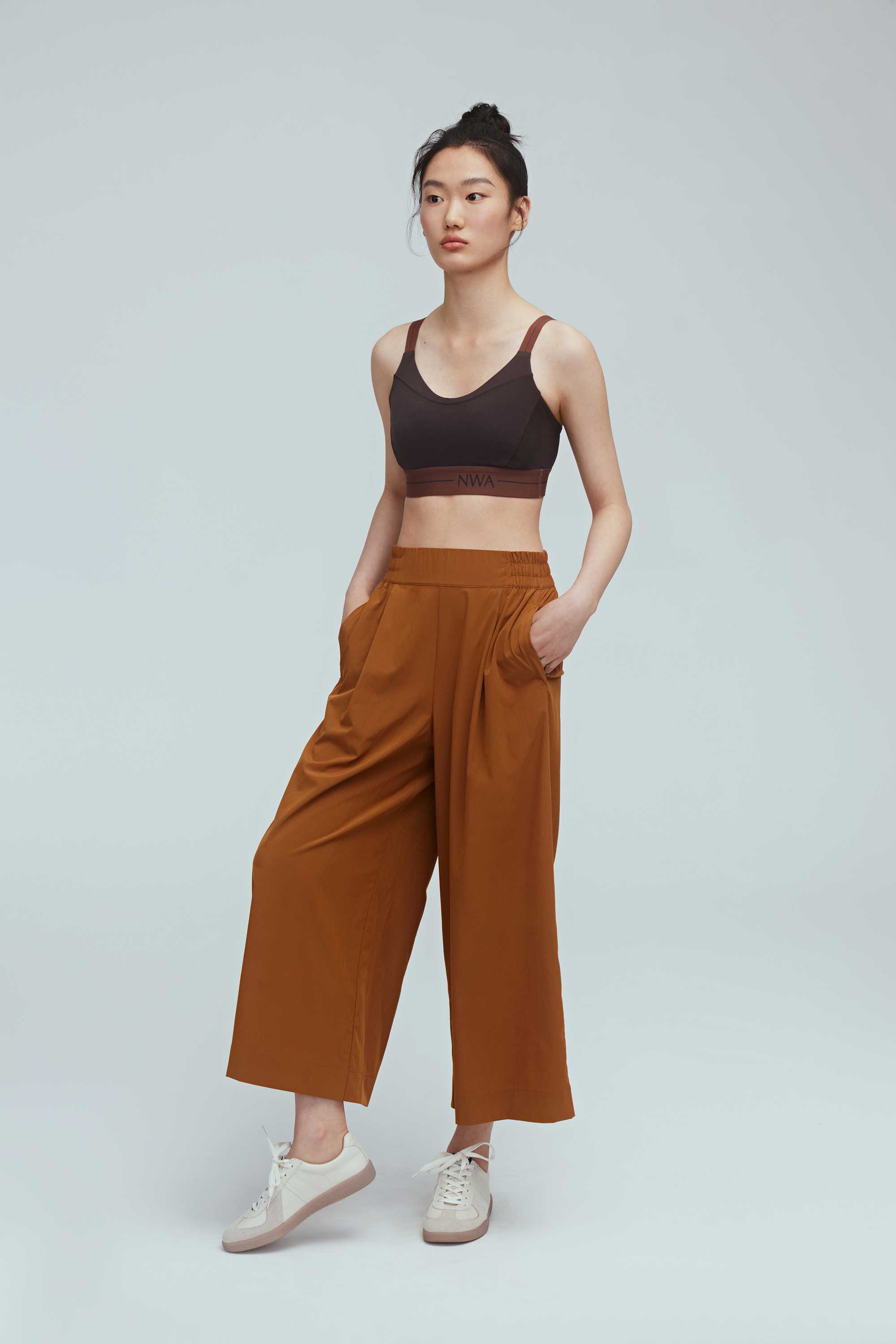 woman in brown culottes