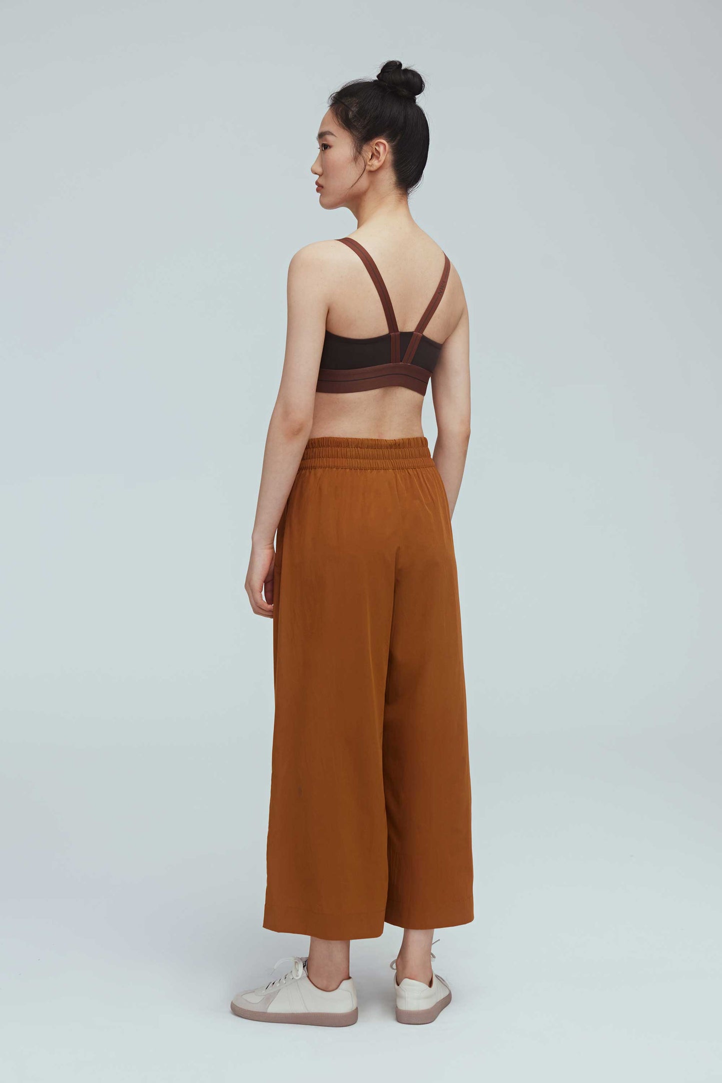 woman in brown culottes