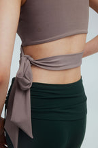 knot detail of light brown wrap bra top