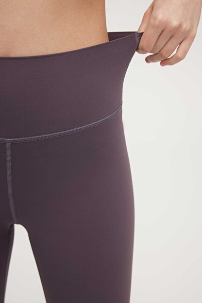 the waist part of purple leggings