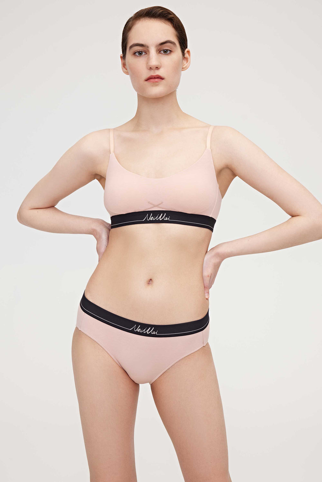 woman in pink bra and brief