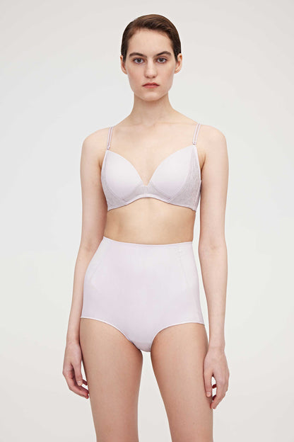 woman in light purple boy shorts