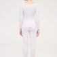 back of woman in light pink thermal set