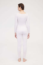 back of woman in light pink thermal set
