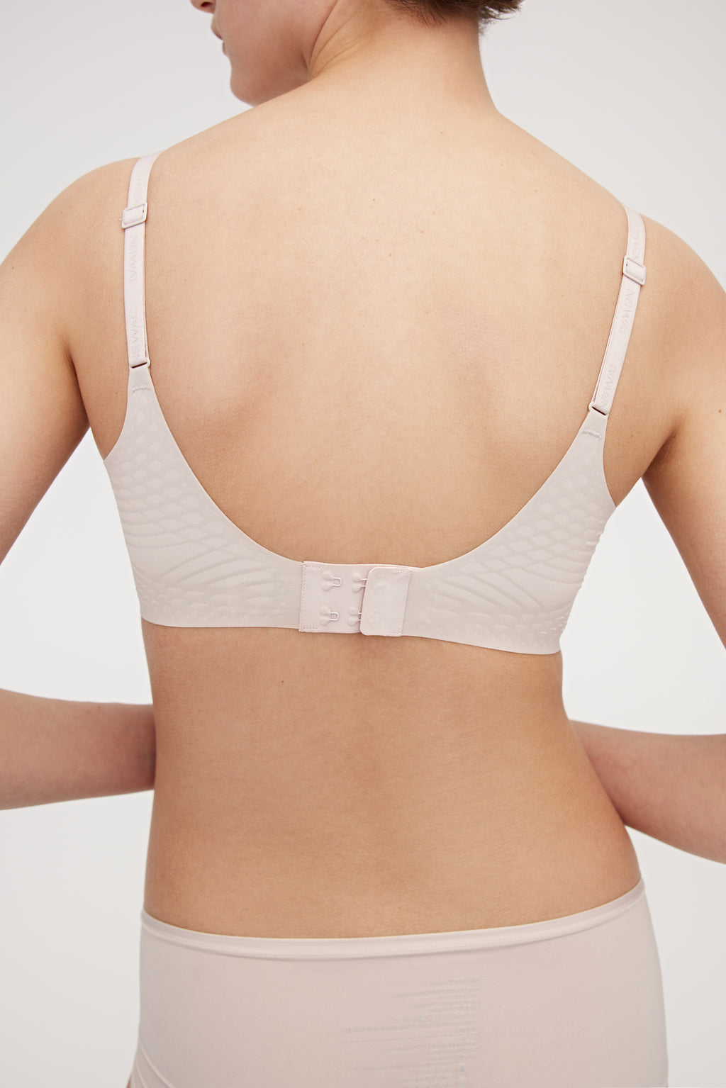 The back of a cream bra