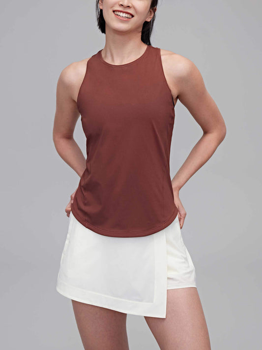 woman in reddish brown tank