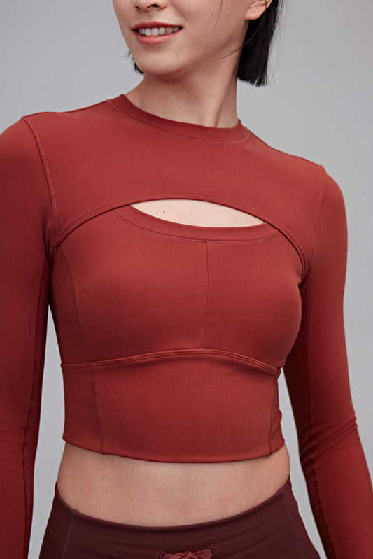 woman in Cut-out Padded Crop Top