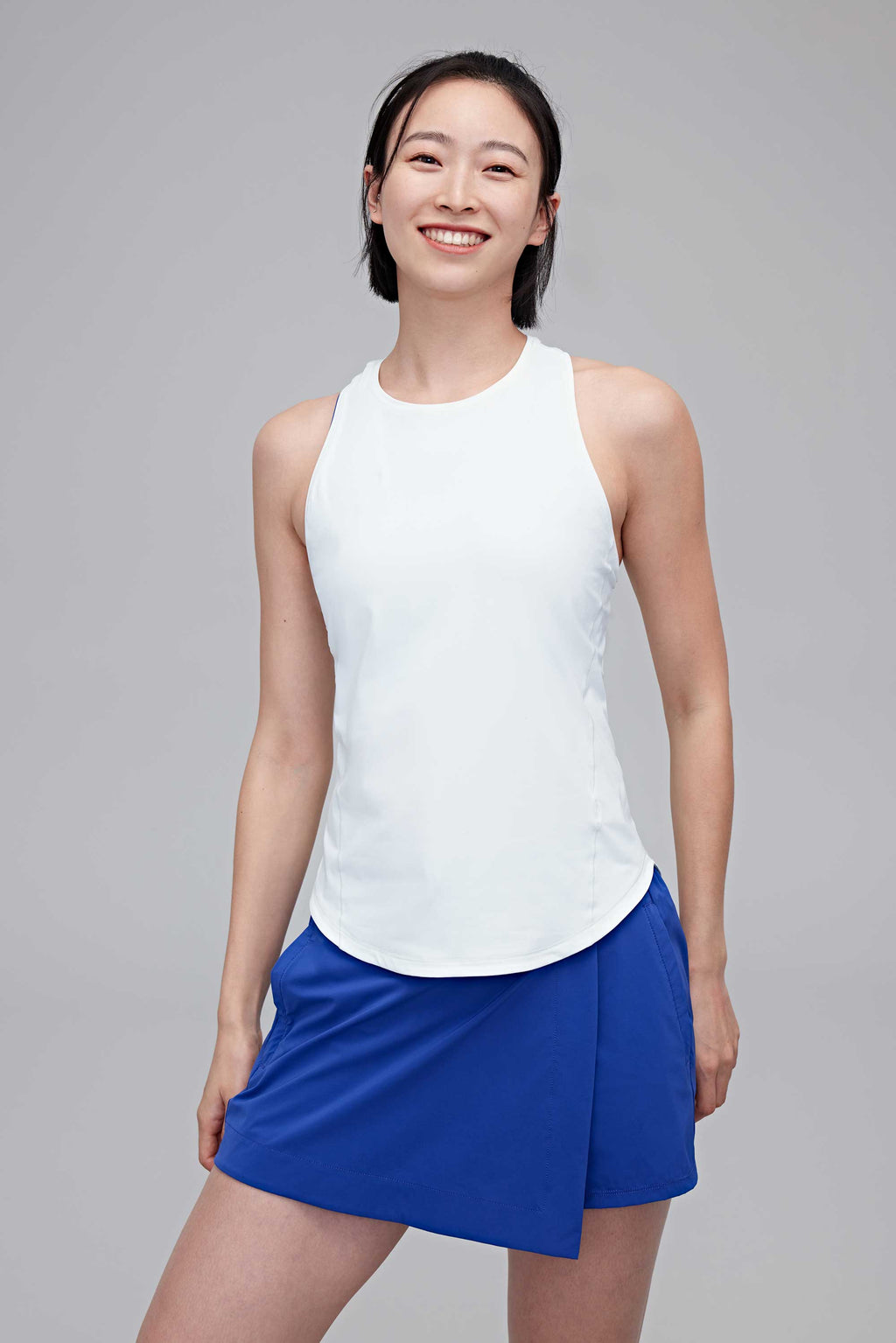 woman in white tank