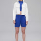 woman in white jackets, blue tank and blue shorts