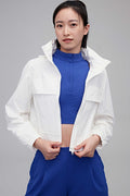 woman in white jacket
