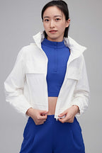 woman in white jacket