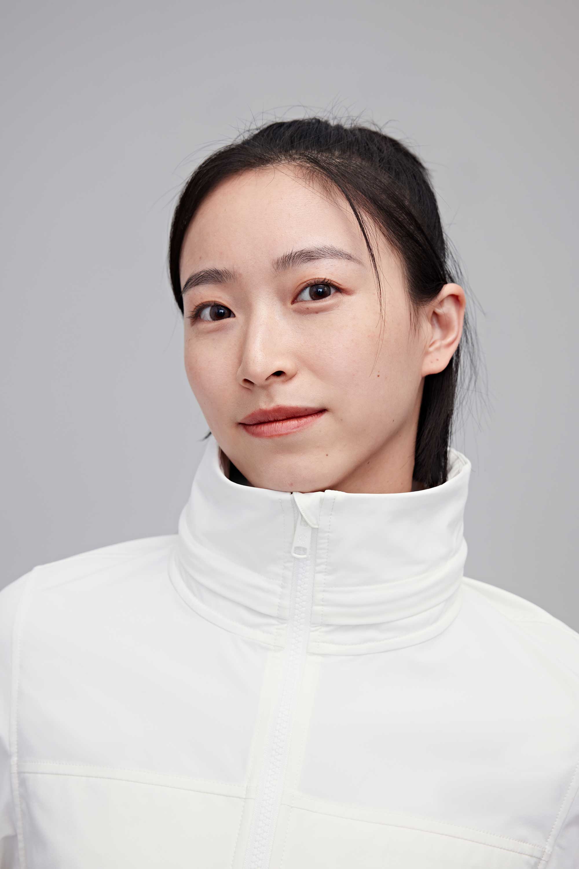 woman in white jacket 