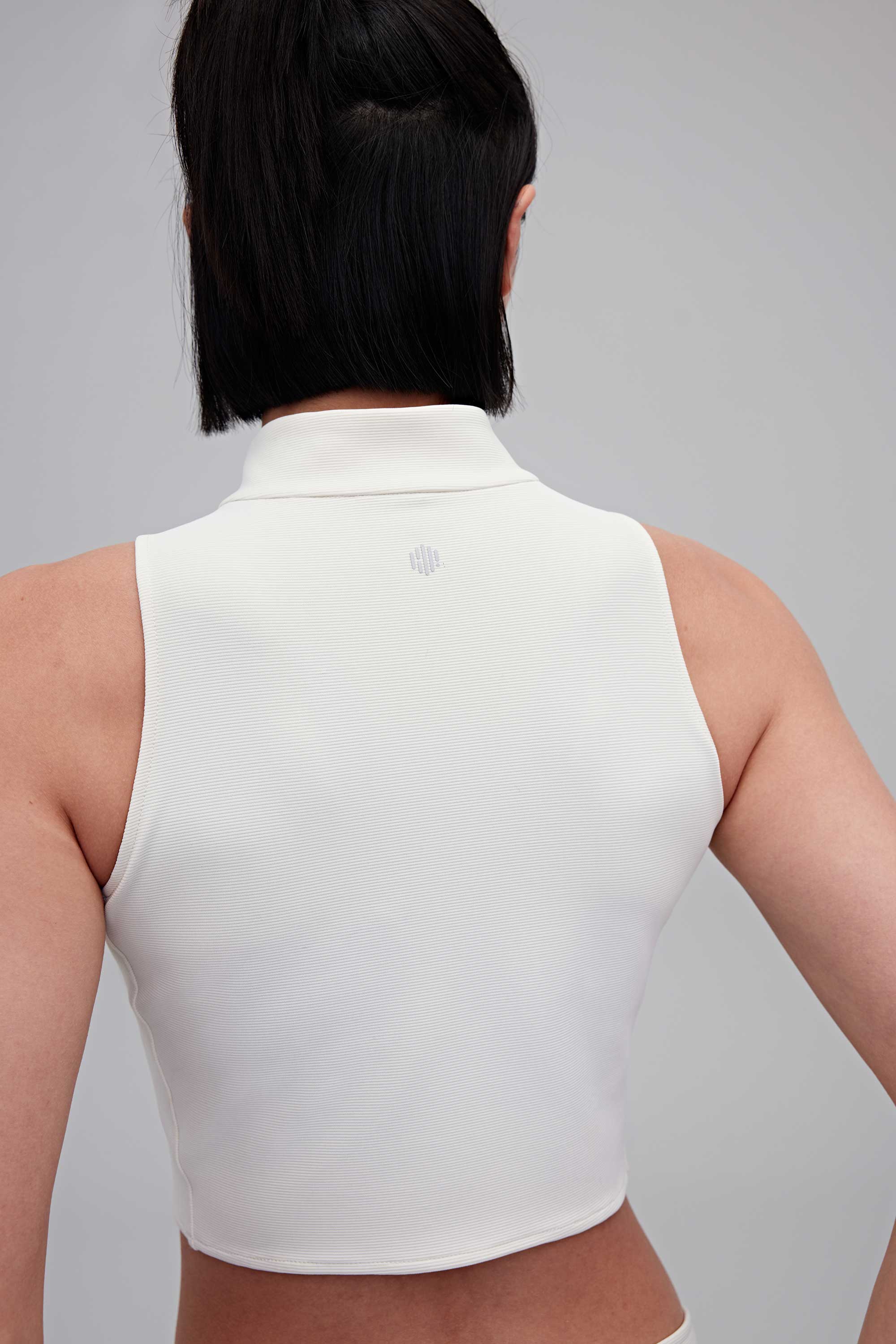 back of white tank
