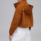 Back of woman in brown jacket