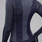 back of woman in navy mock neck top