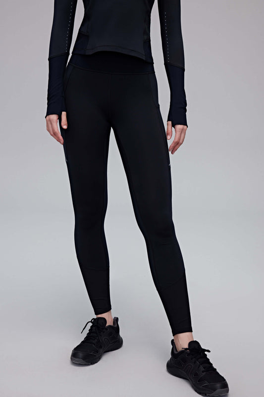 woman in black leggings
