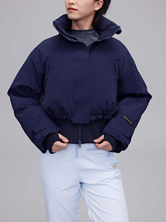 woman in navy down jacket