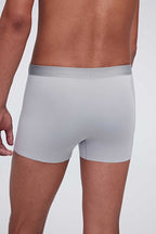 back of man in grey brief