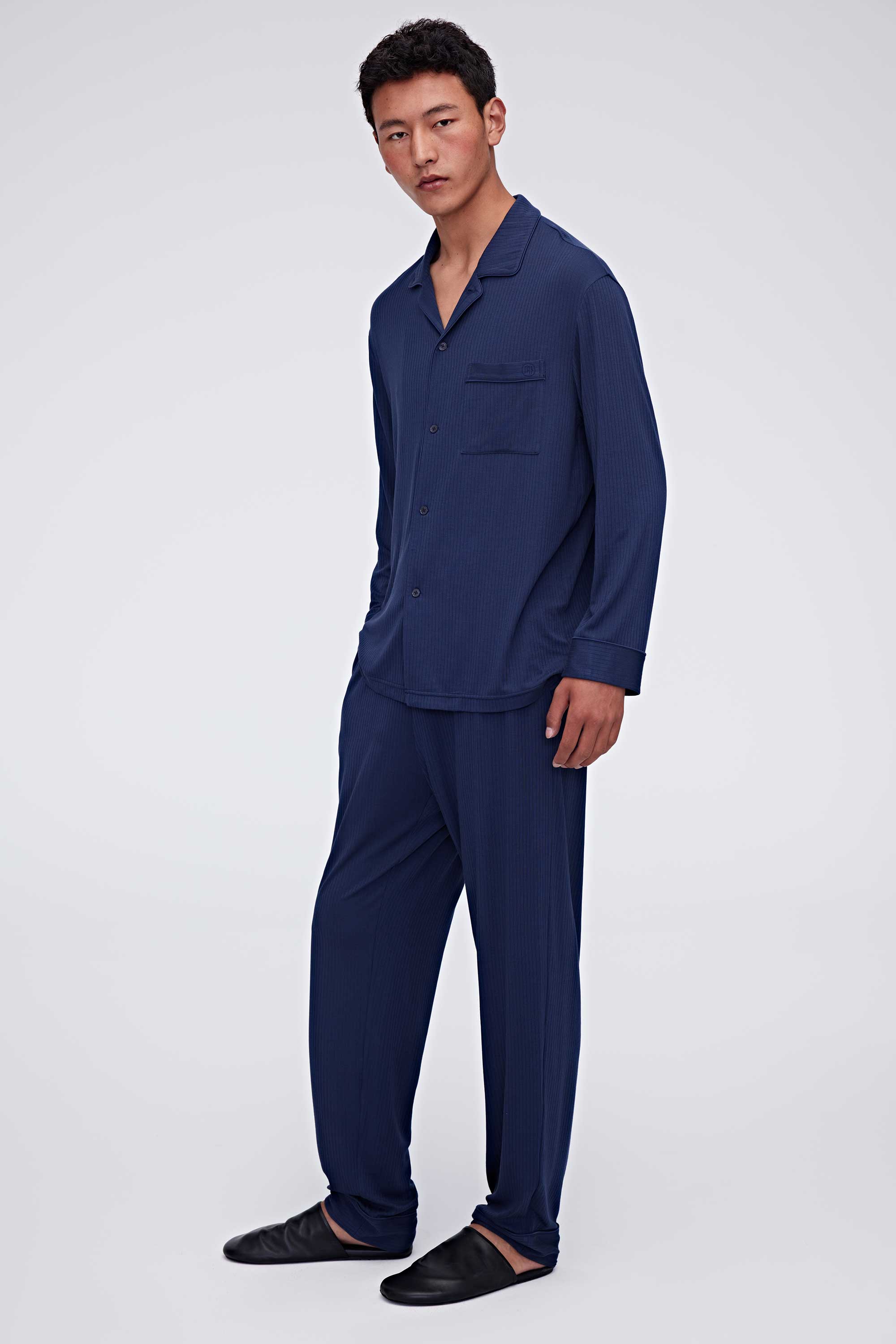 man in tan pajama button up shirt and pants