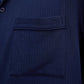 close up of man in navy pajama button up shirt