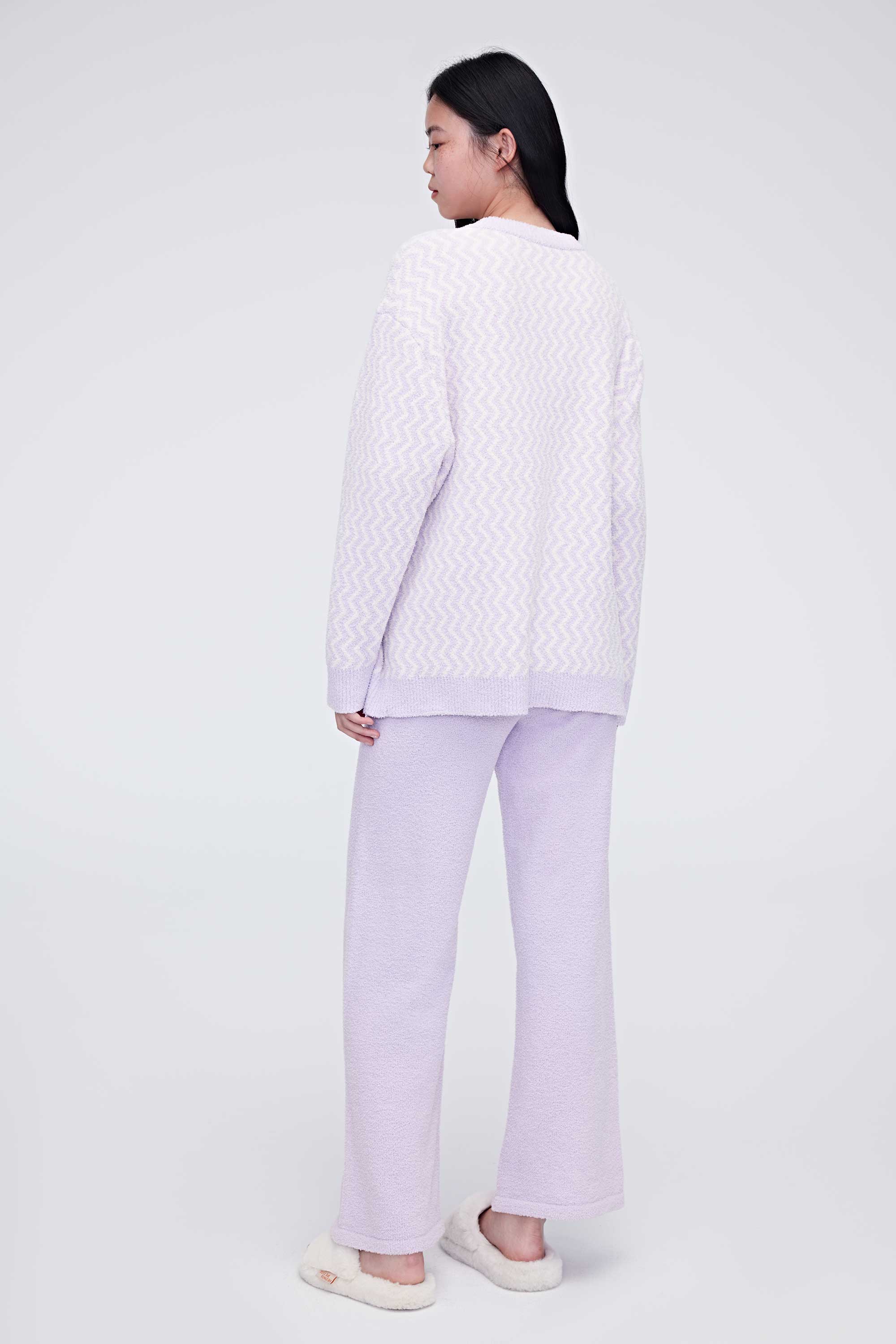 The back of purple plush fleece pajamas