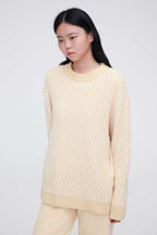 A woman wearing yellow plush fleece pajama top
