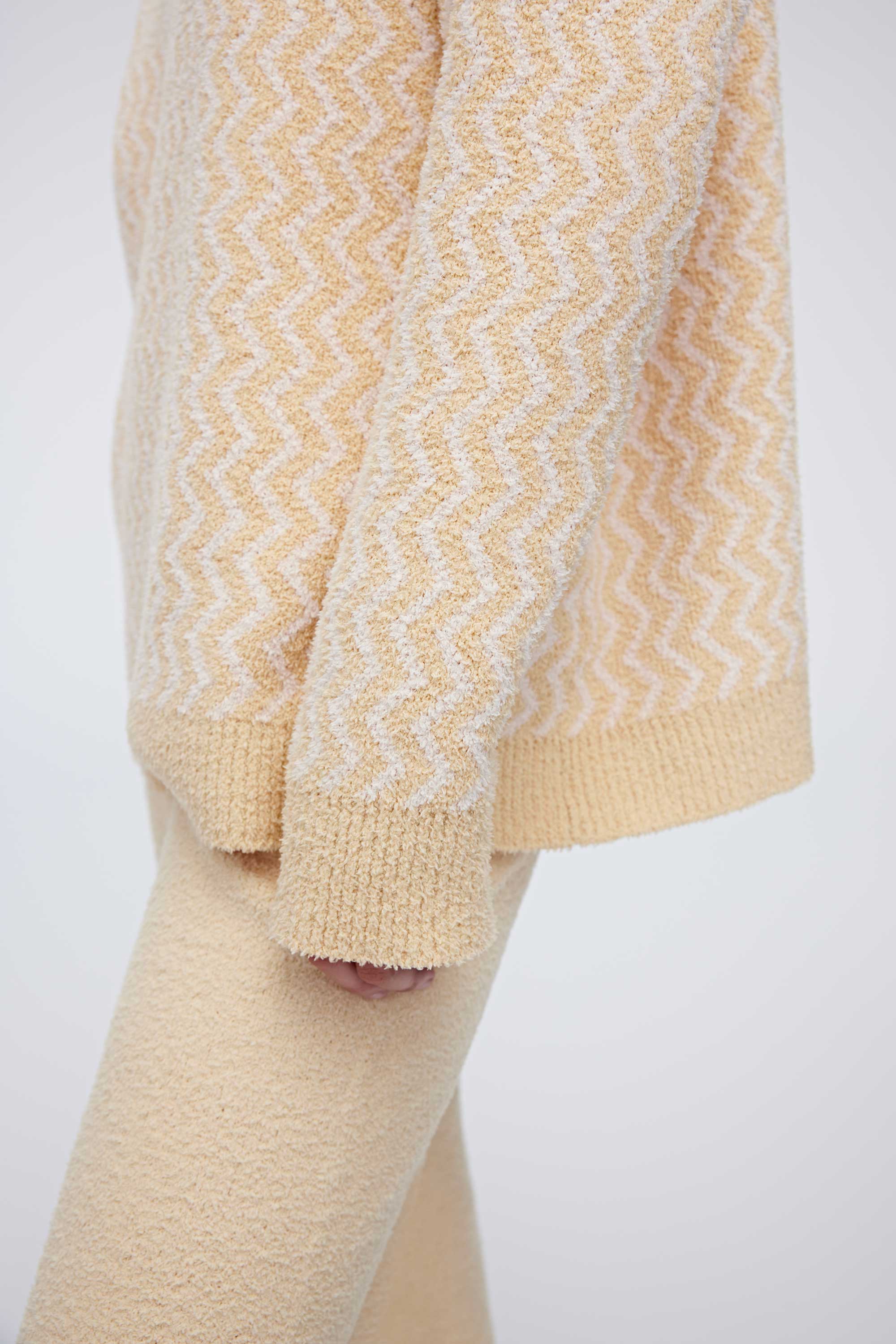 The lower part of yellow plush fleece pajamas