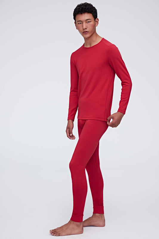 A man wearing a red thermal set