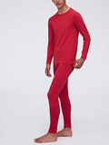A man wearing a red thermal set
