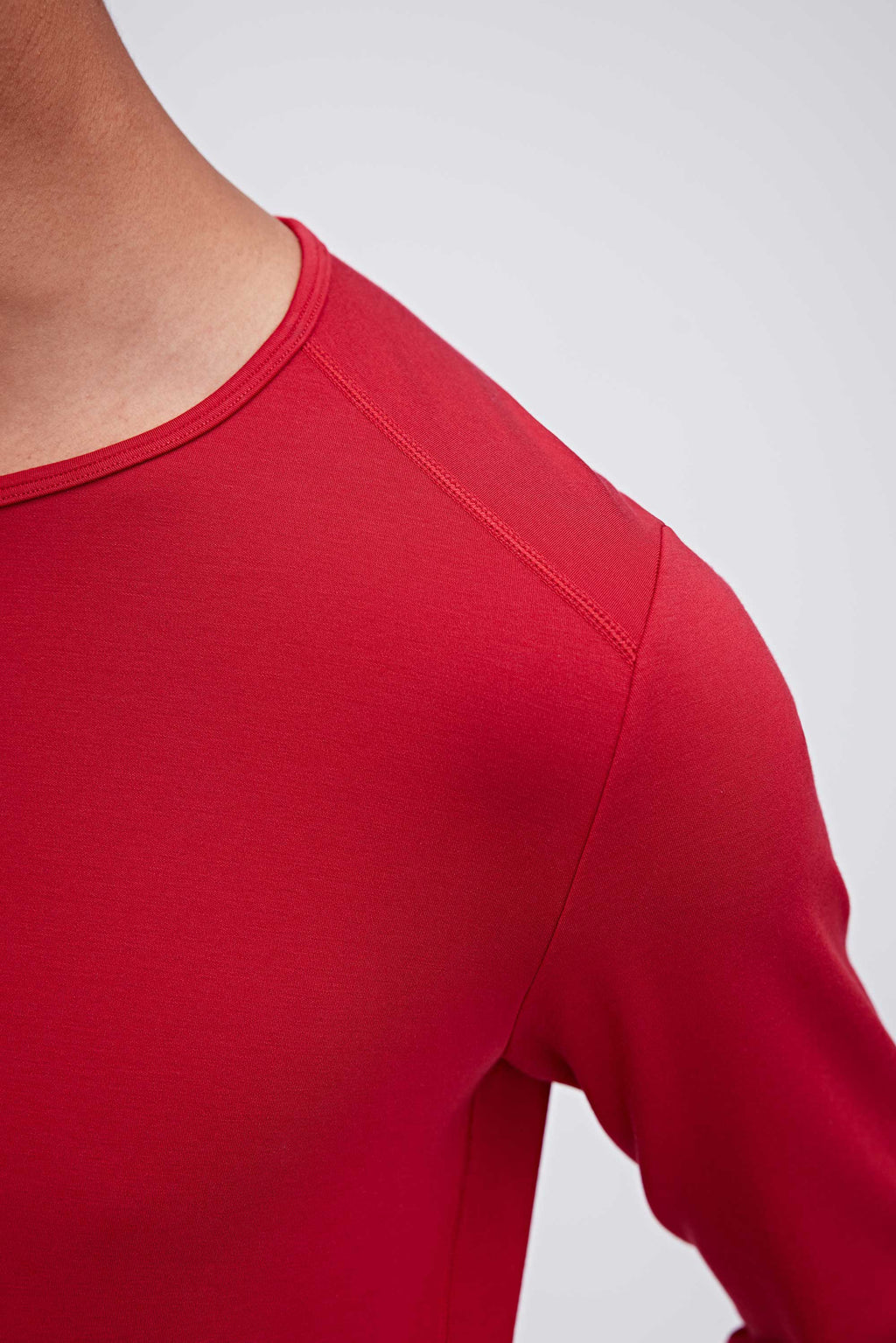 Shoulder line on red thermal top