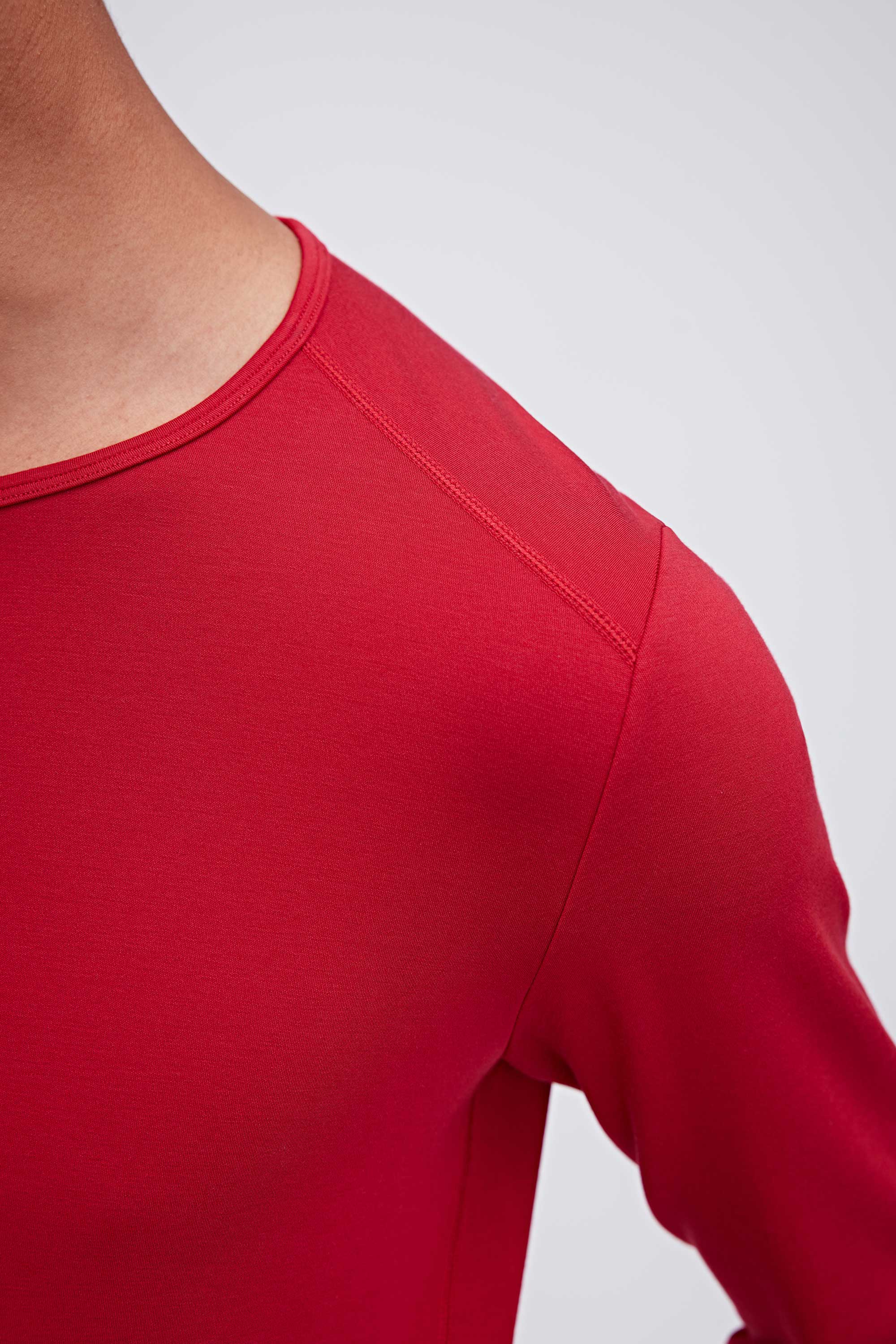 Shoulder line on red thermal top