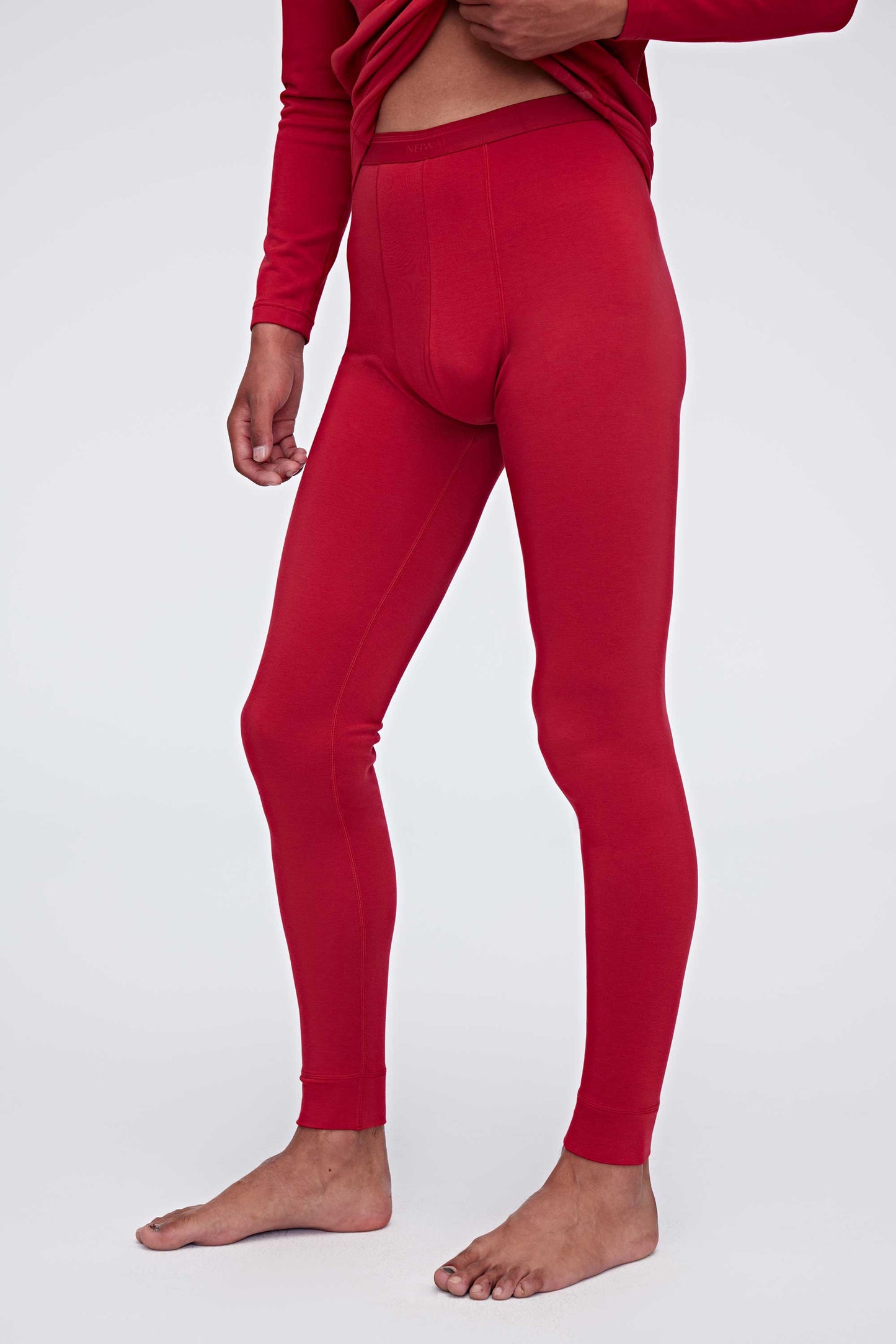 Side view of red thermal pants