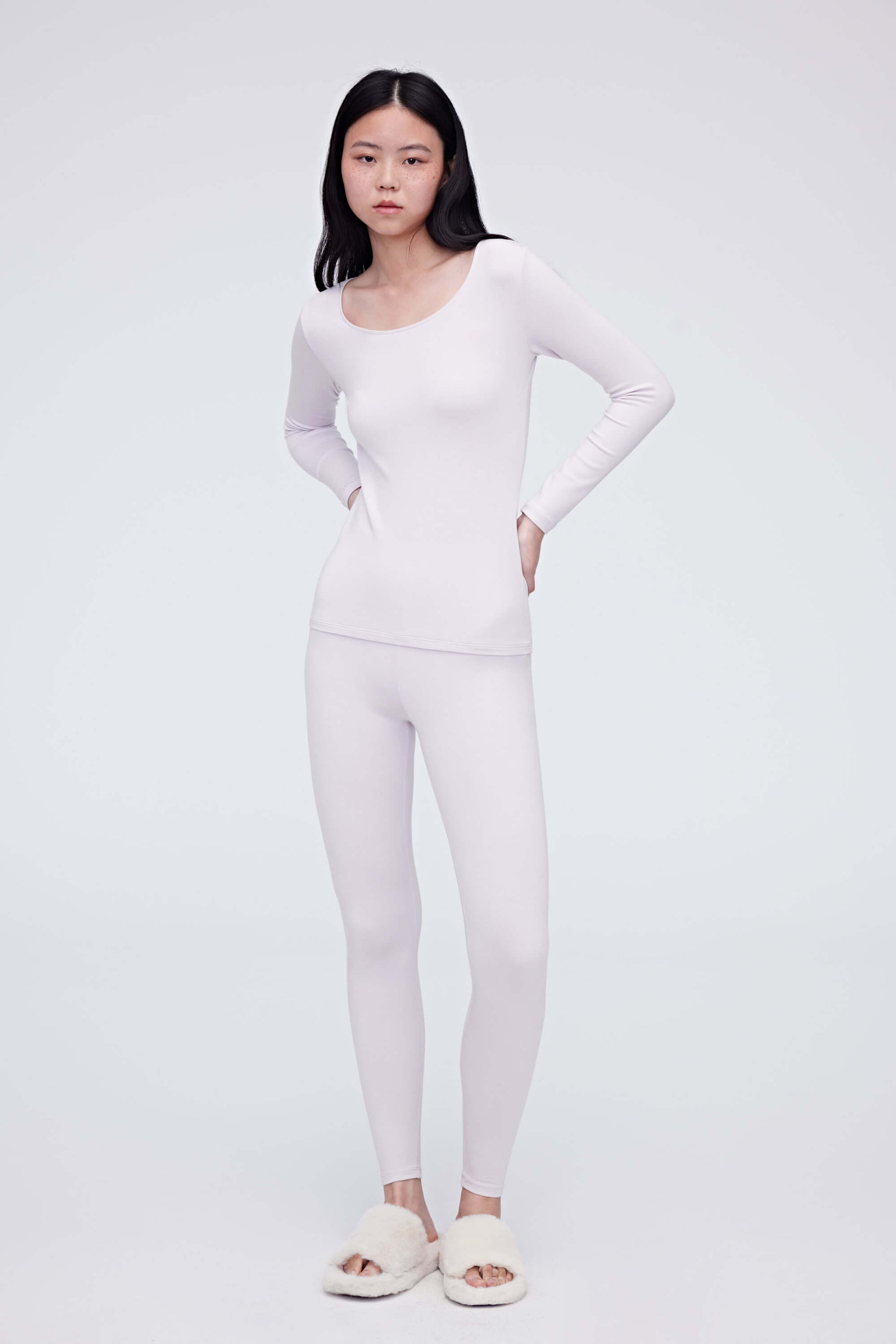 woman in light pink thermal set