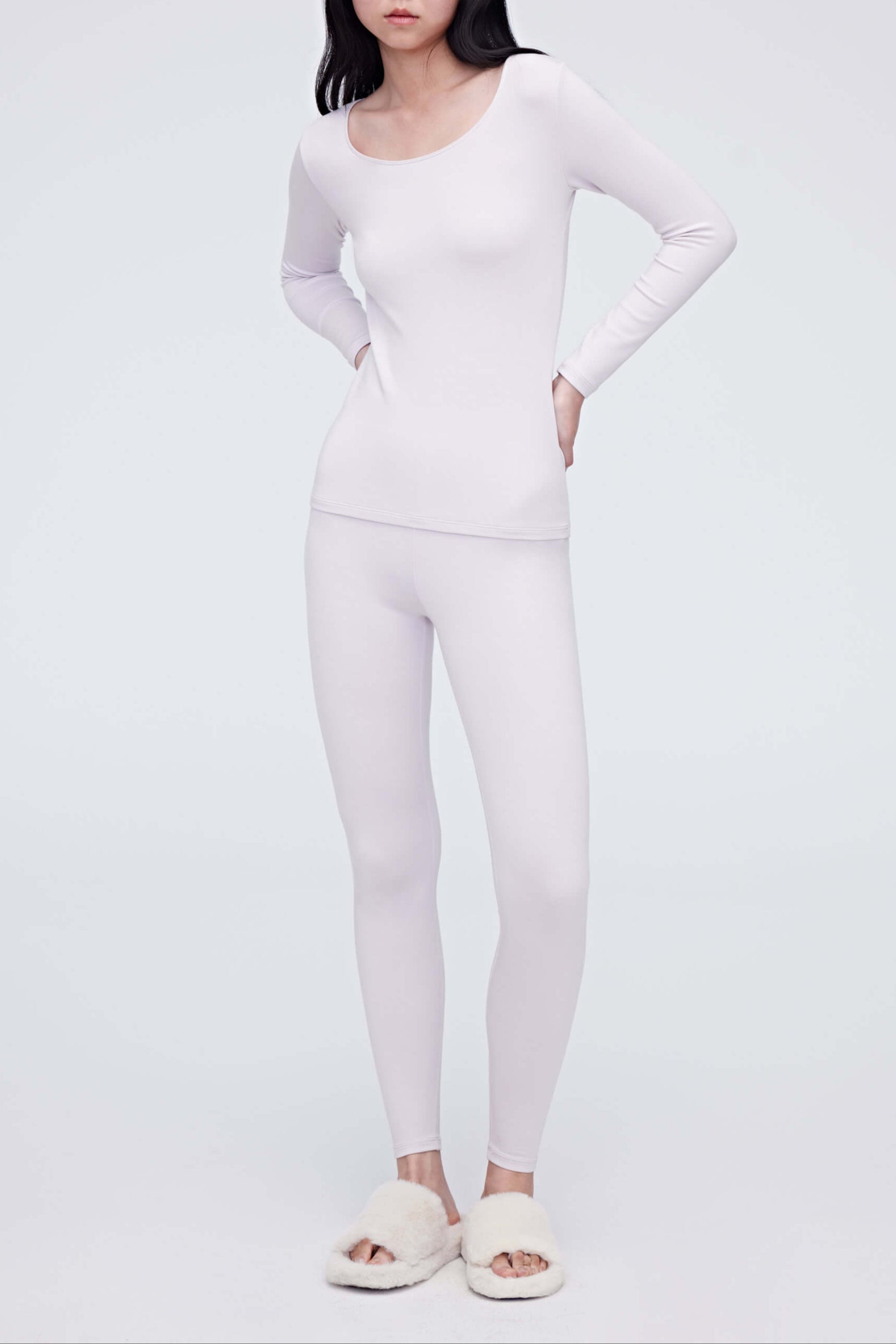 woman in light pink thermal set