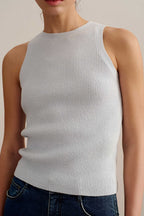 woman wearing a blue tank