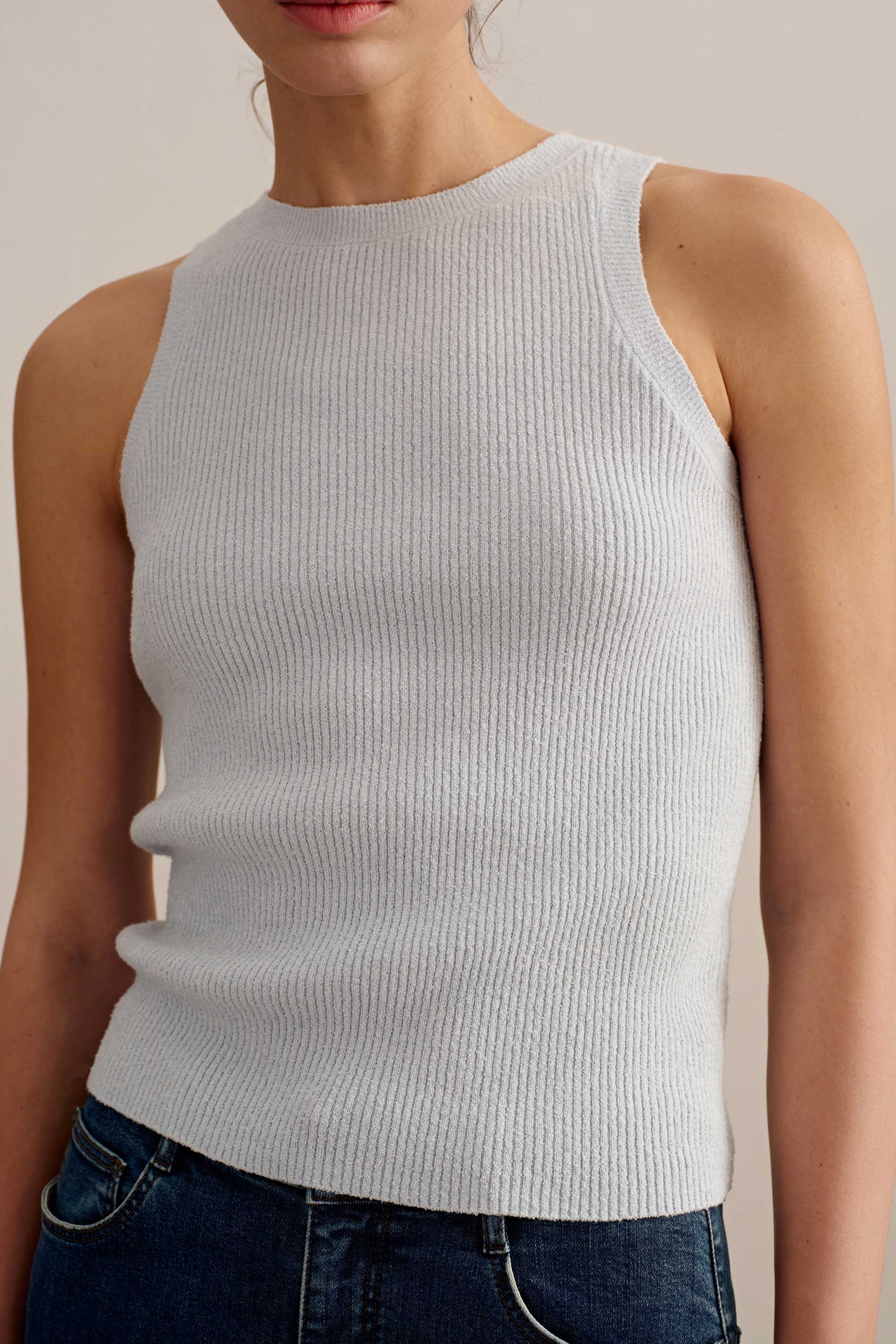 woman wearing a blue tank