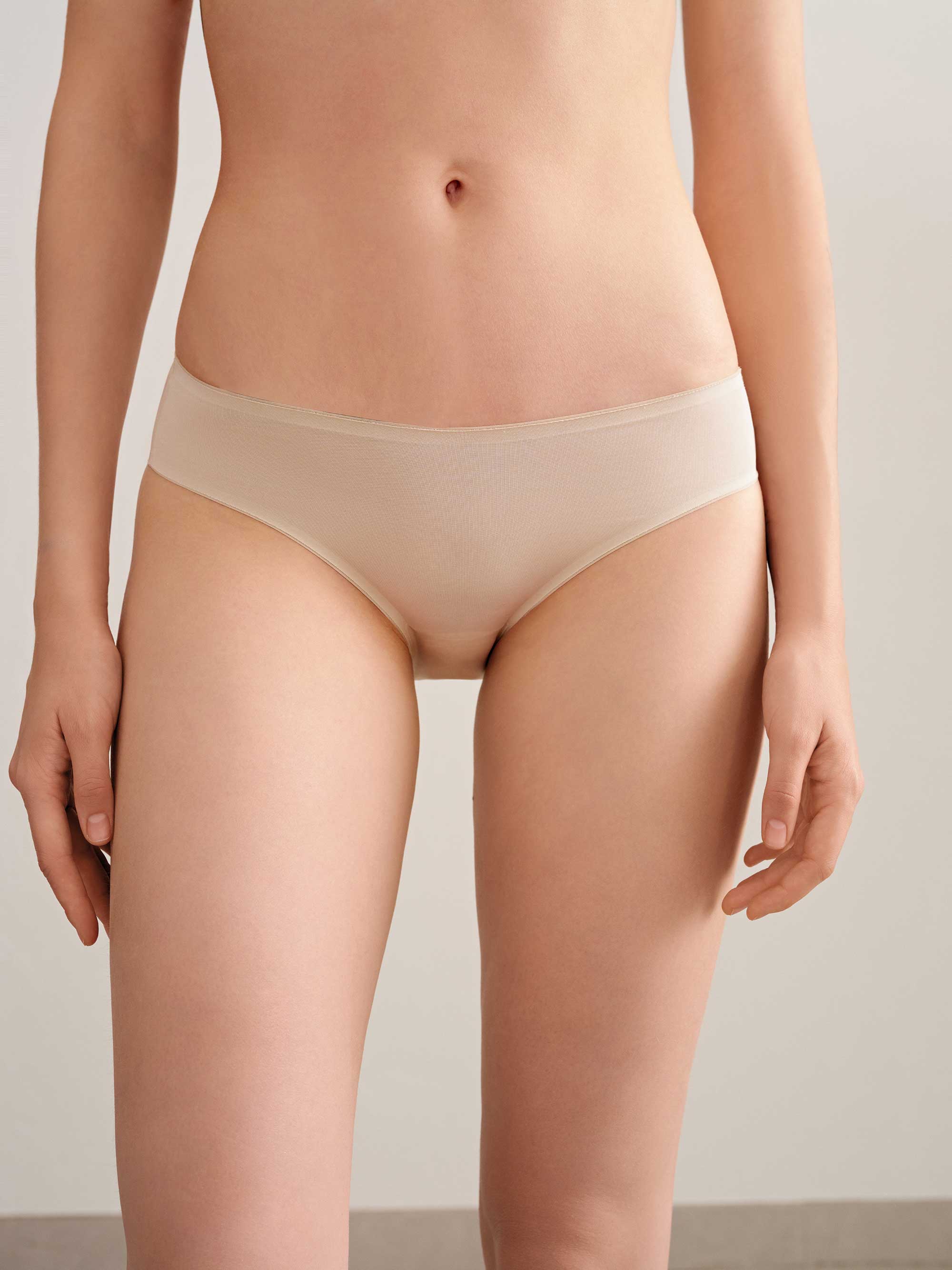 woman in cream brief