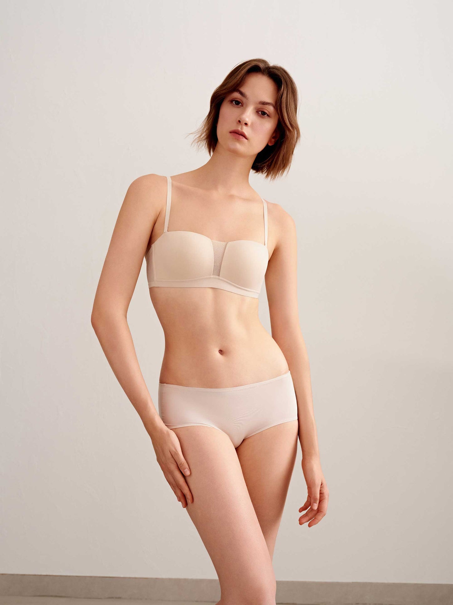 woman in off white bra and brief