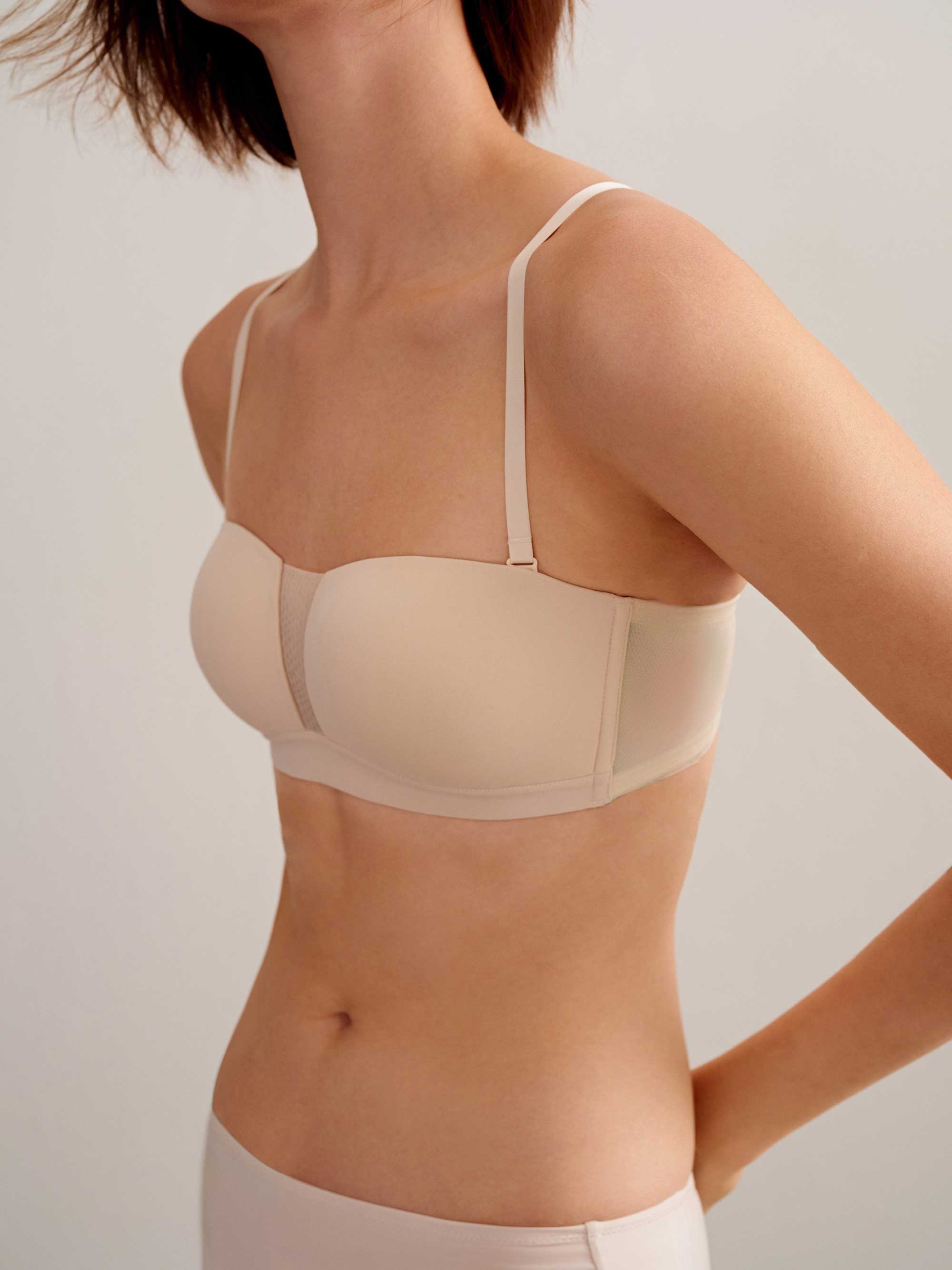 woman in off white bra