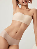 Model wearing nude bandeau bra and briefs. Treacly Almond color. 