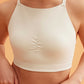 a woman wearing a white sports bra. 