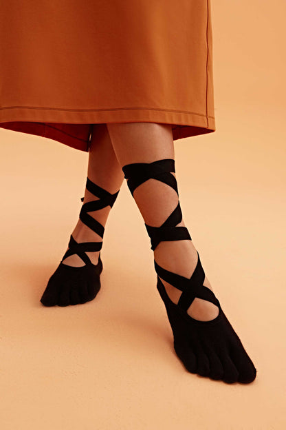 woman wearing barre socks