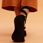 back of a woman wearing barre socks