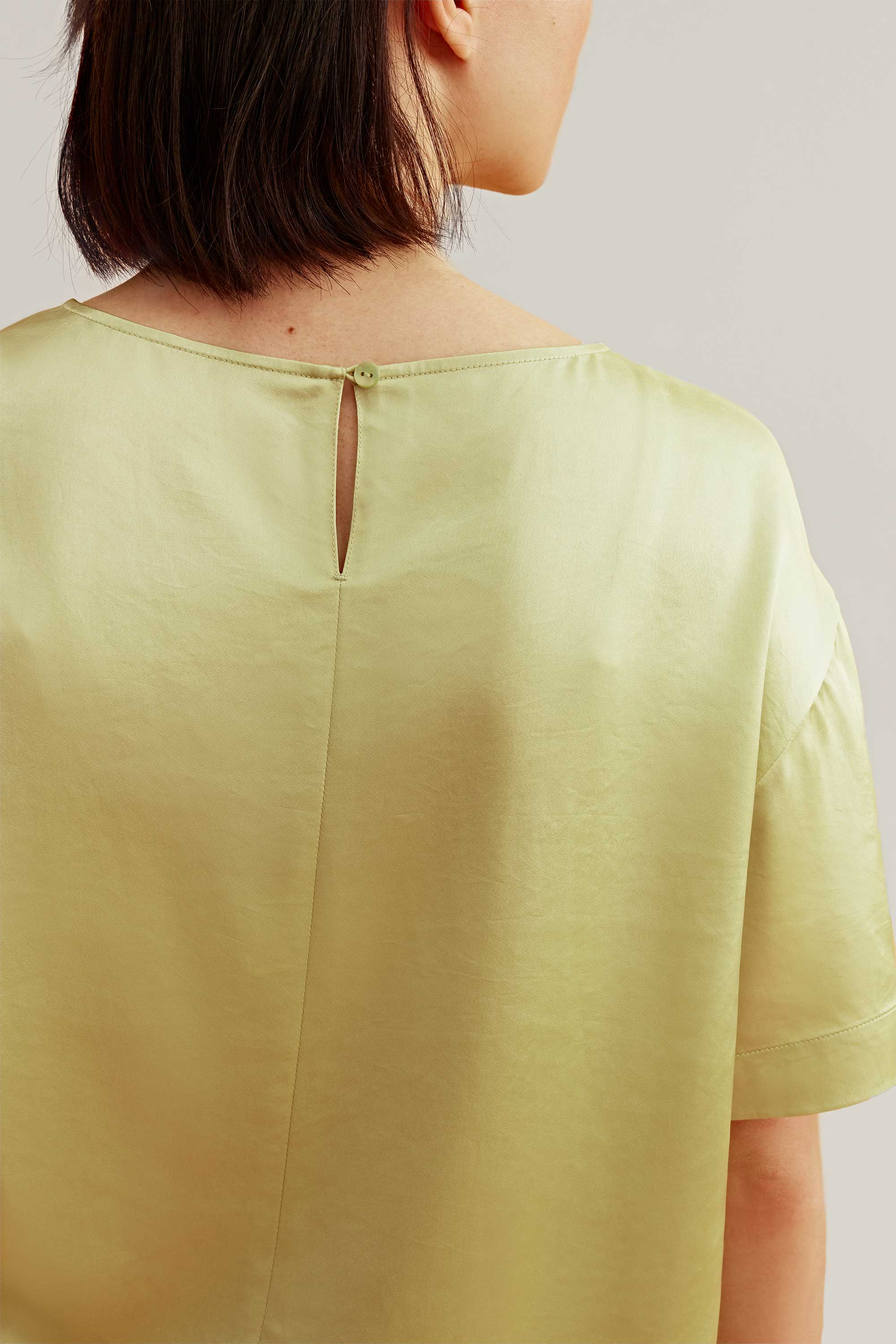 back of the satin green short sleeve