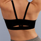 back of a woman wearing a sports bra with V back shape
