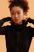 closeup shot of black hooded jacket