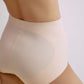 Close-up side view of a model wearing nude high-waisted seamless briefs, highlighting the smooth, sculpting fit and comfortable fabric.