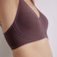 Side view of woman wearing plunge bra in chocolate brown