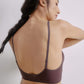 Back view of woman wearing brown bra