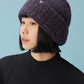 woman wearing purple beanie